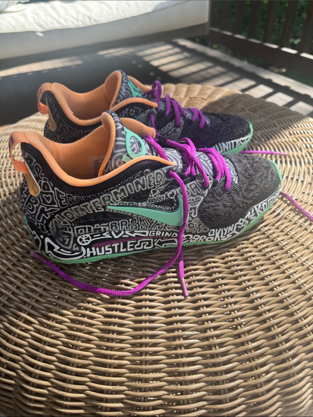 Nike KD’s  Black Graffiti-Print Sneakers with Turquoise Swoosh and Purple Laces